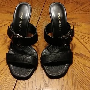 Black, strappy heals w leather upper. Sz 5.5